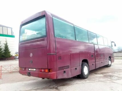 Бордовый автобус Mercedes-Benz O404