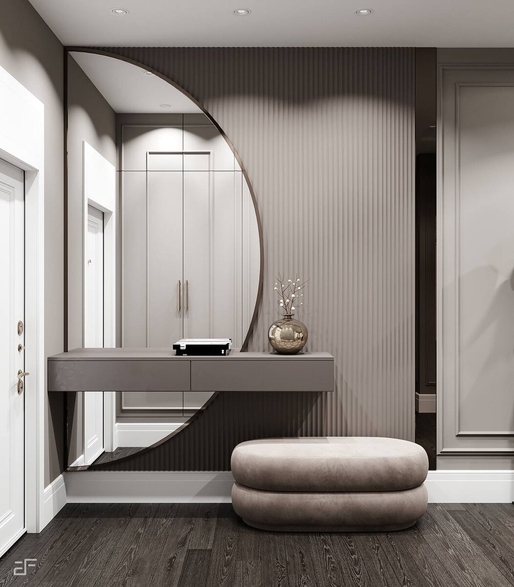 Монохромная гармония: круглое зеркало и парящая консоль в холле