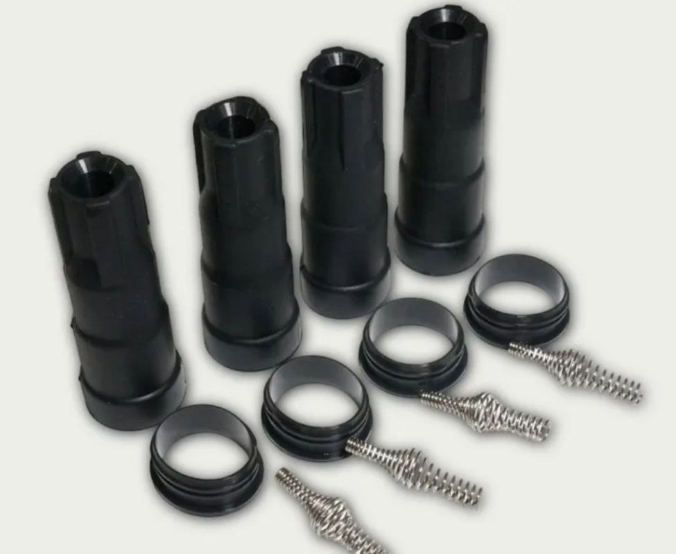 Новые наконечники катушек вместе с резинками и пружинками