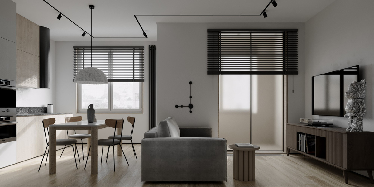 В зонах кухни и гостиной выполнена одинаковая отделка. Этот приём помогает создать ощущение цельного пространства. Интерьер в брутальном минимализме для холостяка в ЖК «Октябрьское поле», дизайнер Алина Донец