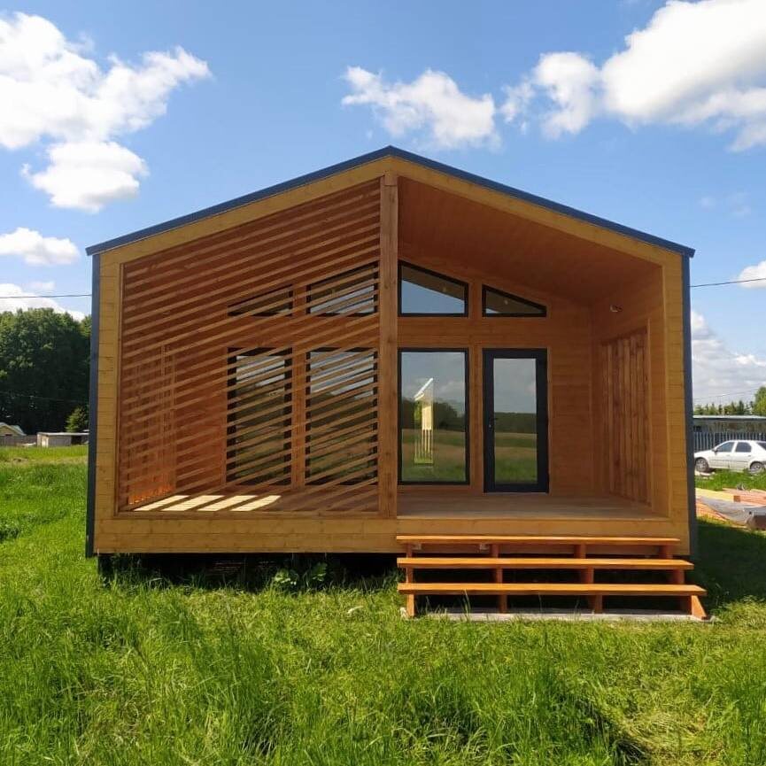 Реализованнный "под ключ" проект дома в стиле БАРНХАУС от компании Лидер Дач