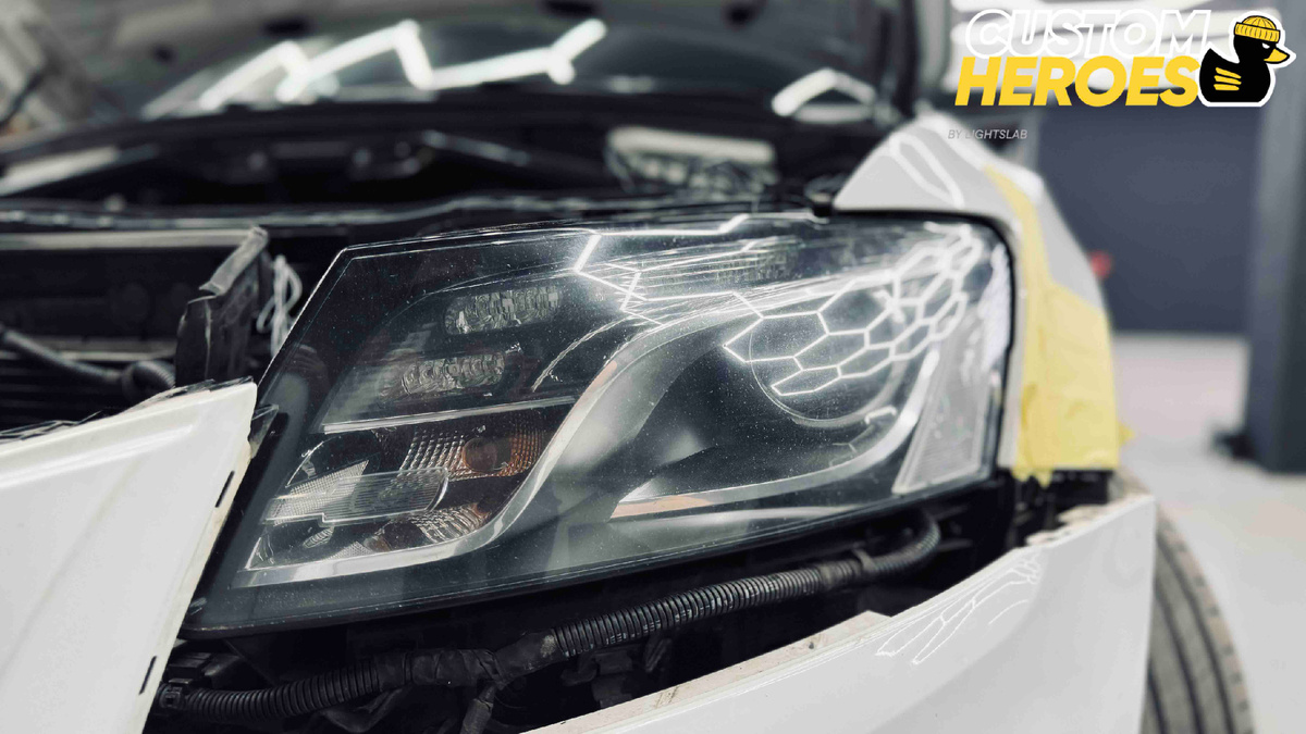 Источник фото: https://custom-heroes.ru/raboty/vid-uslugi/avtosvet/remont/audi-q5-zamena-stekol-far-linz-aozoom-mini-q1-i-obnovlenie-ptf/