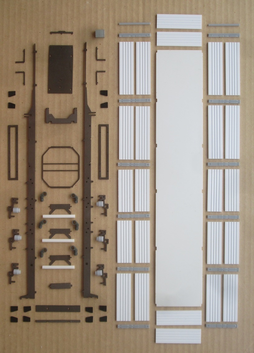 Комплект металлических и пластиковых деталей для сборки: Трехосный полуприцеп-зерновоз с пневмоподвеской НефАЗ-93341-40-07 для современных седельных тягачей