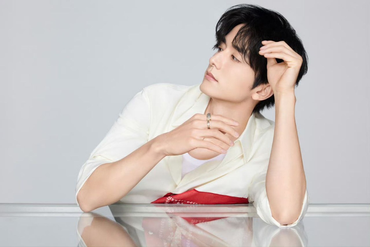 Чжан Синьчэн...