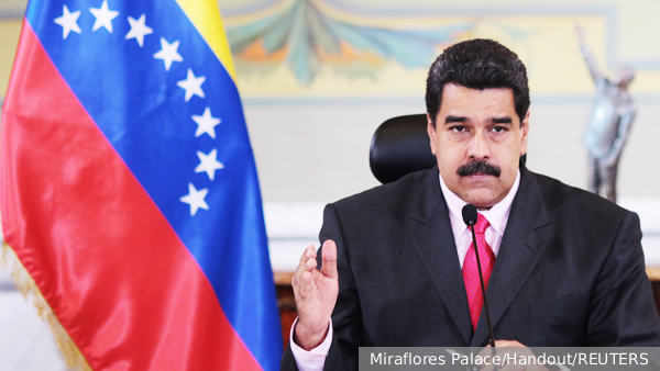     Фото: Miraflores Palace/Handout/REUTERS   
 Текст: Евгений Крутиков