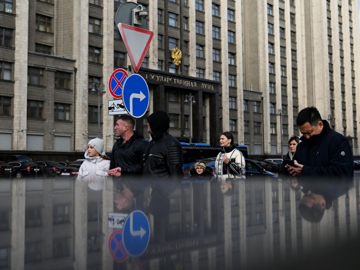    Люди на улице Охотный ряд в Москве© РИА Новости / Кристина Кормилицына