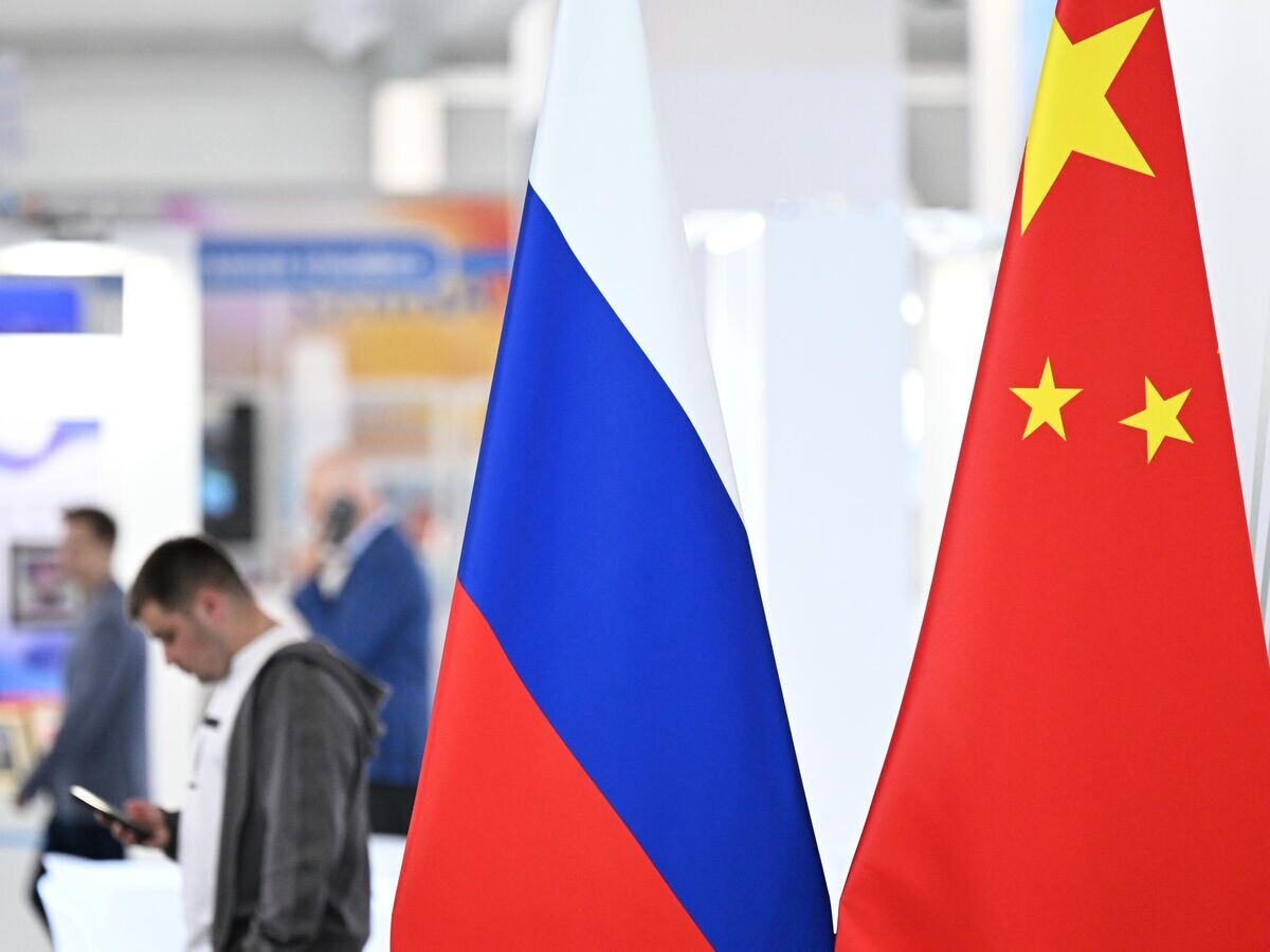   Флаги России и Китая© РИА Новости / Пелагия Тихонова