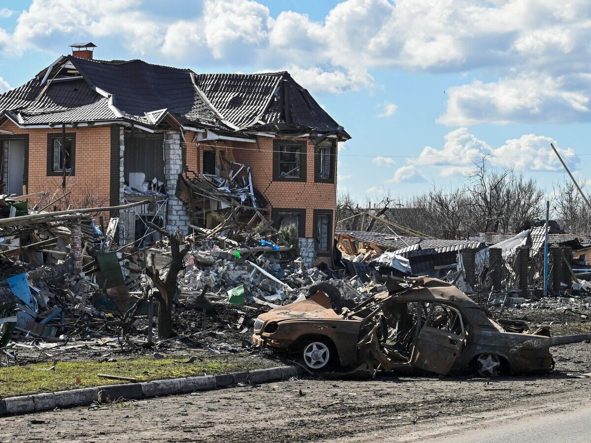    Разрушенные строения в Судже© РИА Новости / Станислав Красильников