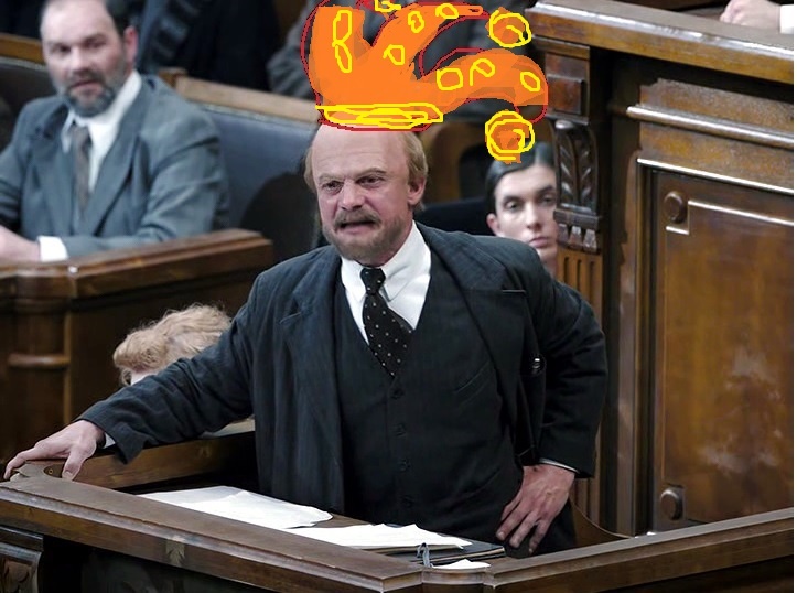 Надеюсь, вы простите мне маленькое хулиганство) Головной убор на очень плохо загримированном актёре как бы символизирует кого в этом сериале играет Ткачук (настоящего шута горохового). Настоящего Ленина я очень люблю и уважаю. Фото из открытых источников