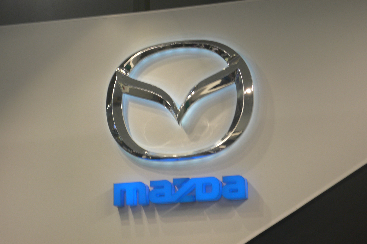Эмблема Мазда