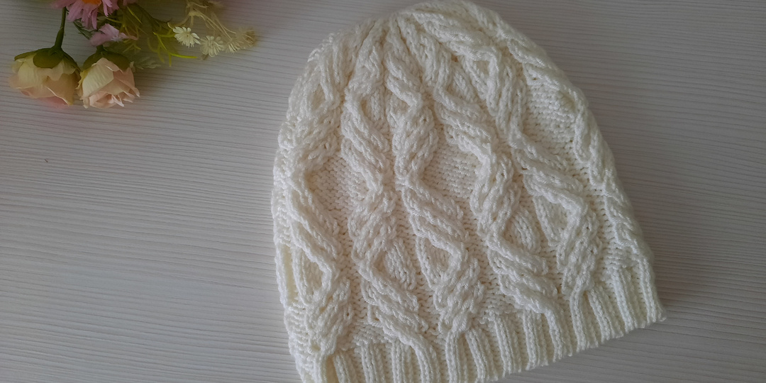 Шапка с косами.