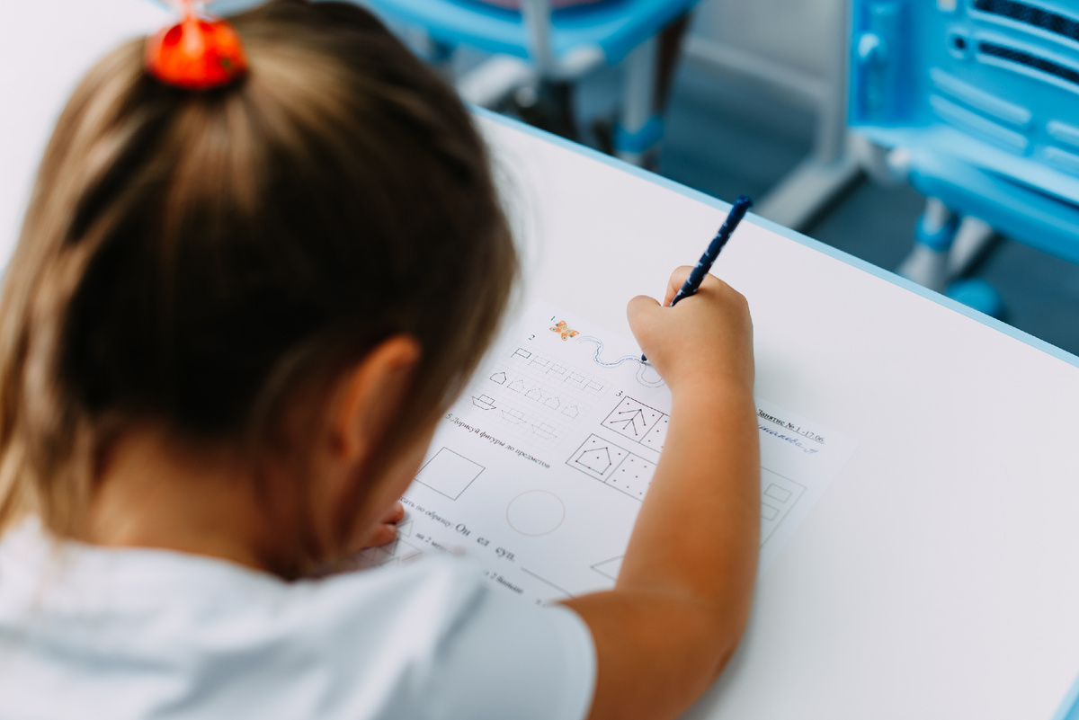 На занятии.