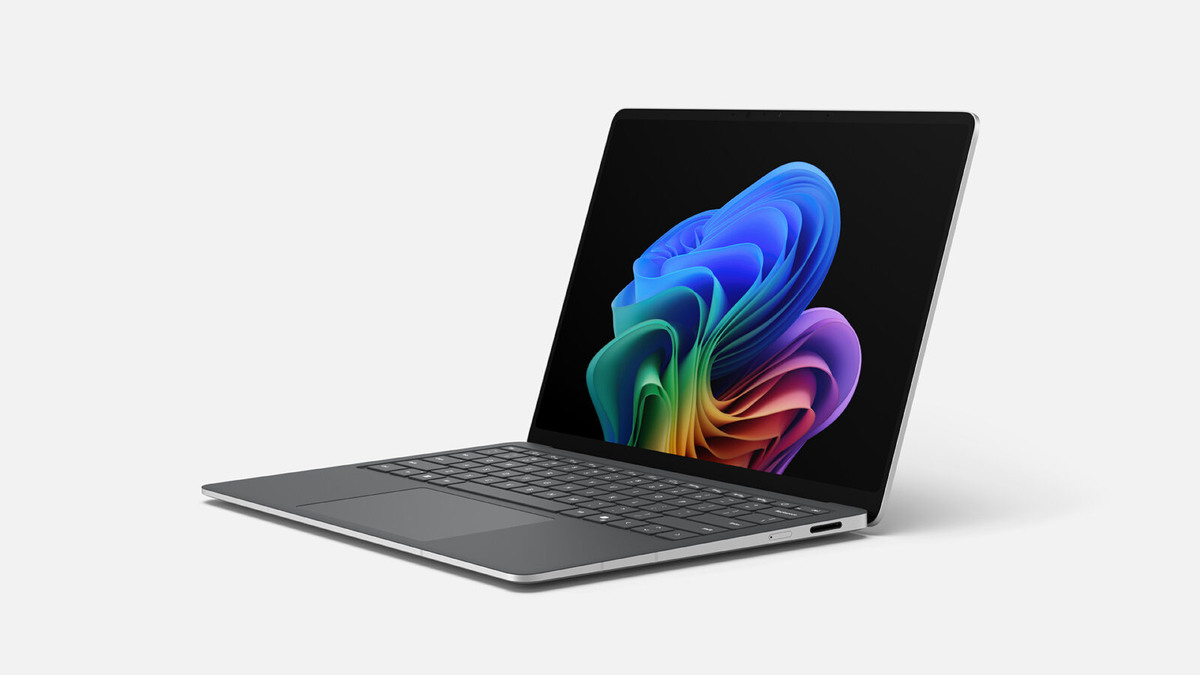 Render of a Surface Laptop 5G with Intel, platinum, front-facing left 3/4 view