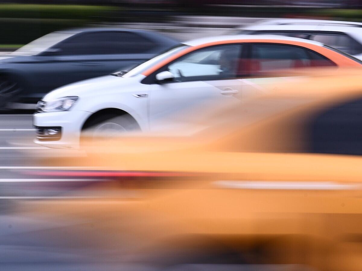    Автомобиль сервиса "Делимобиль"© РИА Новости / Евгений Одиноков