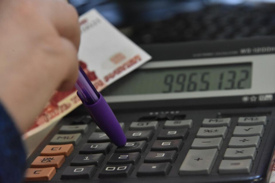    Деньги, калькулятор. Источник: Алексей Кунилов / media4media.ru