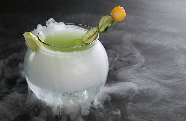 Sumit Surai. Копия. Goblet of Fire - a cocktail made with tequila and lemon zest with hint of chilli, served over a bowl of dry ice - "Кубок огня" - коктейль, приготовленный из текилы и лимонной цедры с оттенком перца чили, подается в миске с сухим льдом.