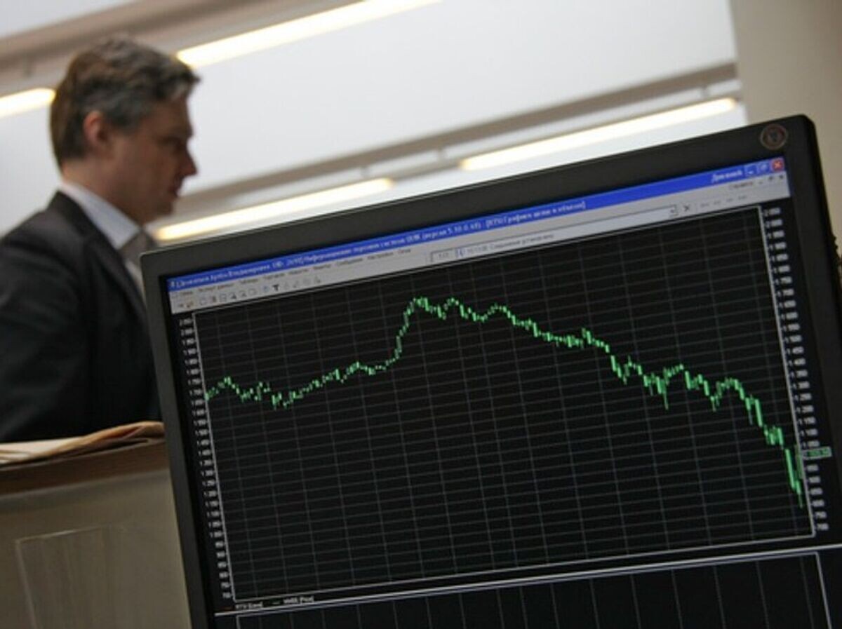    Работа в офисе инвестиционной компании© РИА Новости / Роман Галкин