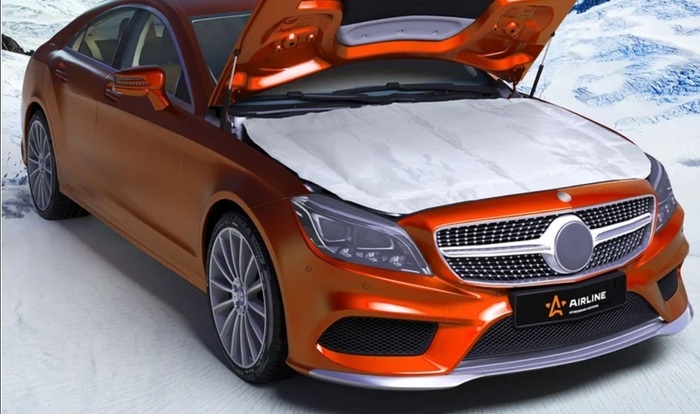 Одеяло, укрывающее автомобильный двигатель