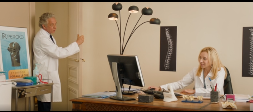 Супруга главного героя, страдающего болями в спине. Уверена в своих медицинских диагнозах, ревностно и категорично следит за выполнением ее предписаний, но, к сожалению, супругу все так же плохо.