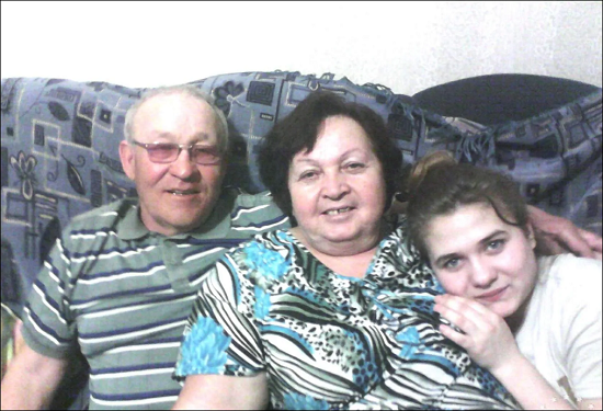 С мужем Егором и внучкой Александрой.