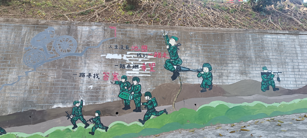 Некоторое таинственное граффити рядом с южным входом в университет. Что делает этот парень со снайперкой?!