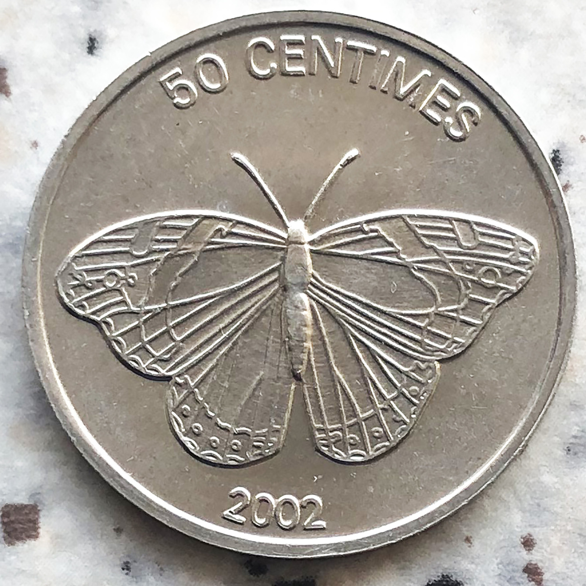 Конго ДРК   50 сентим 2002 бабочка. Фото автора. 