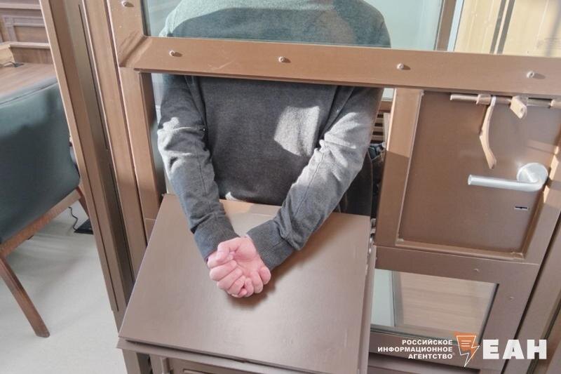    ЕАН. Подсудимый в клетке