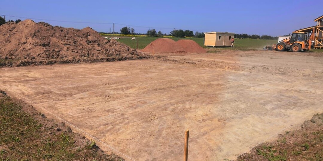 Что делать с землёй из-под фундамента?