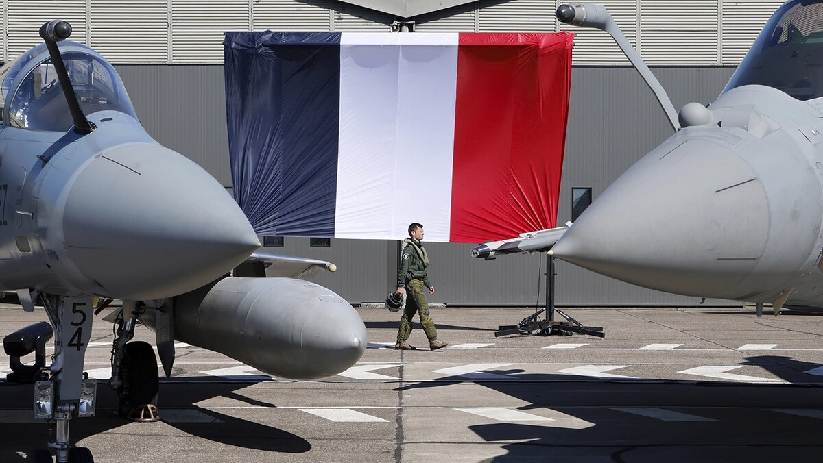   Ludovic Marin / AFP / AP