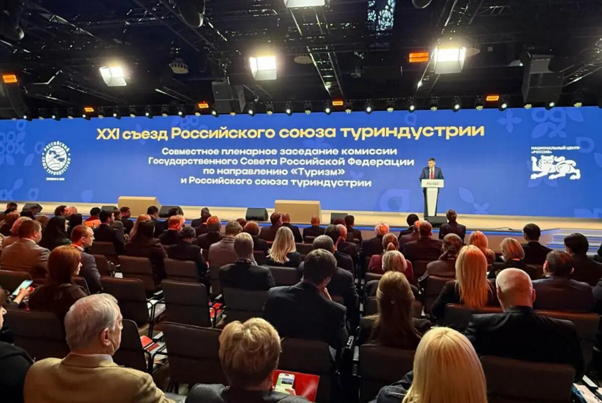     Перед участниками съезда выступает глава Минэкономразвития Максим Решетников. © "Интерфакс". Юлия Батырь