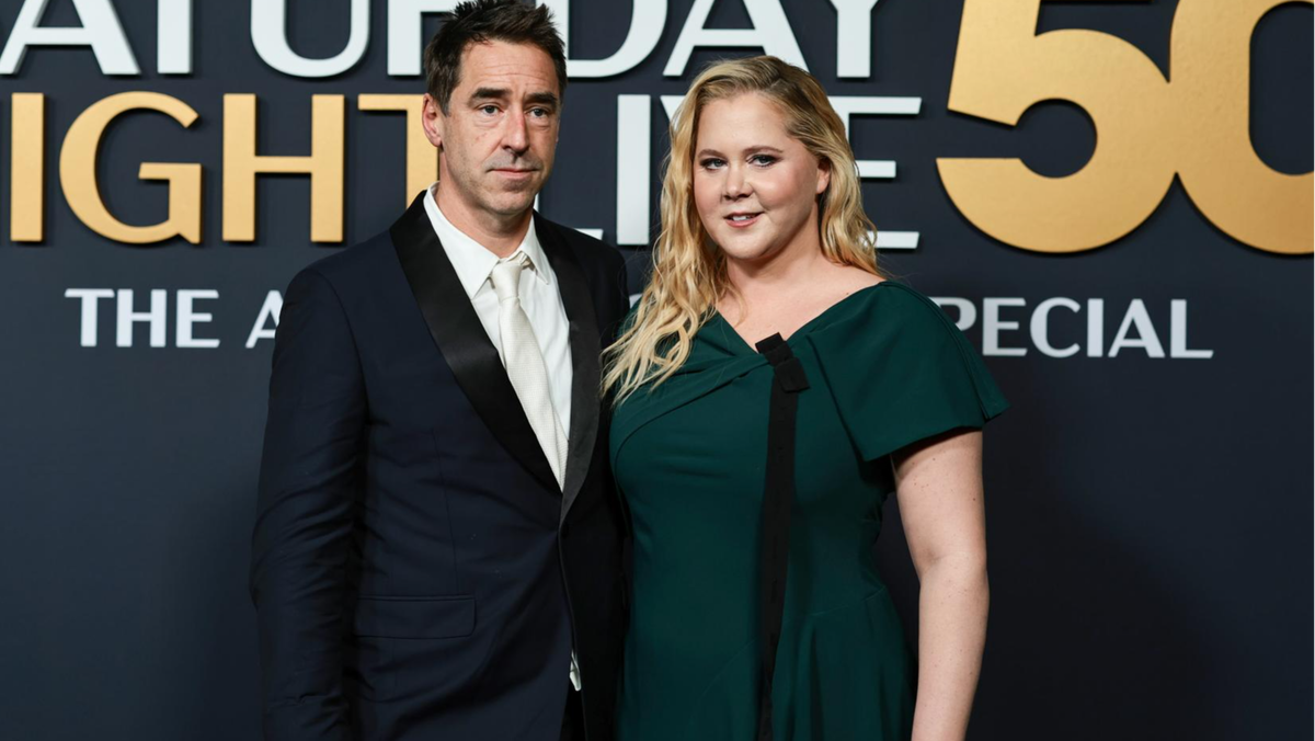    Крис Фишер и Эми Шумер. Фото: Getty Images