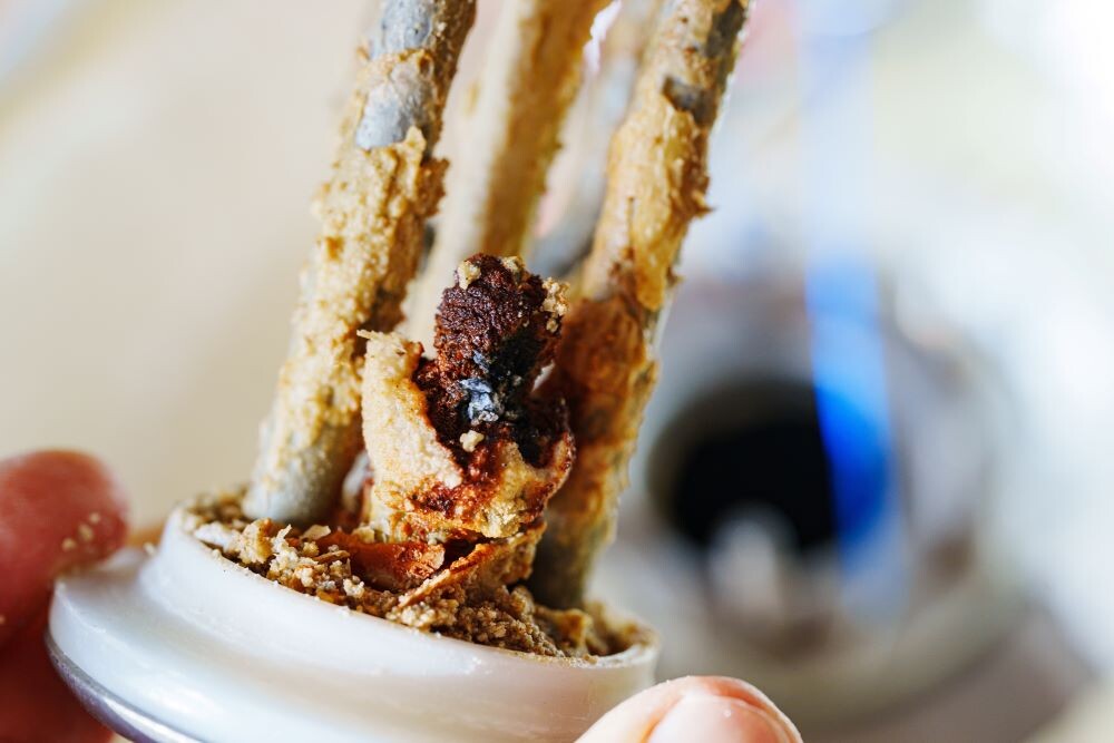 Накипь и ржавчина на ТЭН из стиральной машины