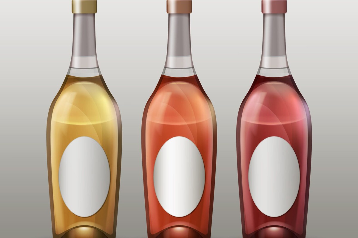    Vector set of full colored bottles with empty labels front view isolated on gradient background