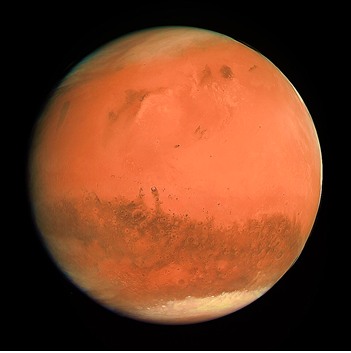 Изображение Марса на основе снимков АМС «Розетта», сделанных 24 февраля 2007 года с расстояния 240 000 км.  По изображению видно, что южный полюс планеты направлен к Солнцу, поскольку Красная планета на снимке перед Солнцем (освещена им).