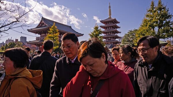    © AP / Louise Delmotte