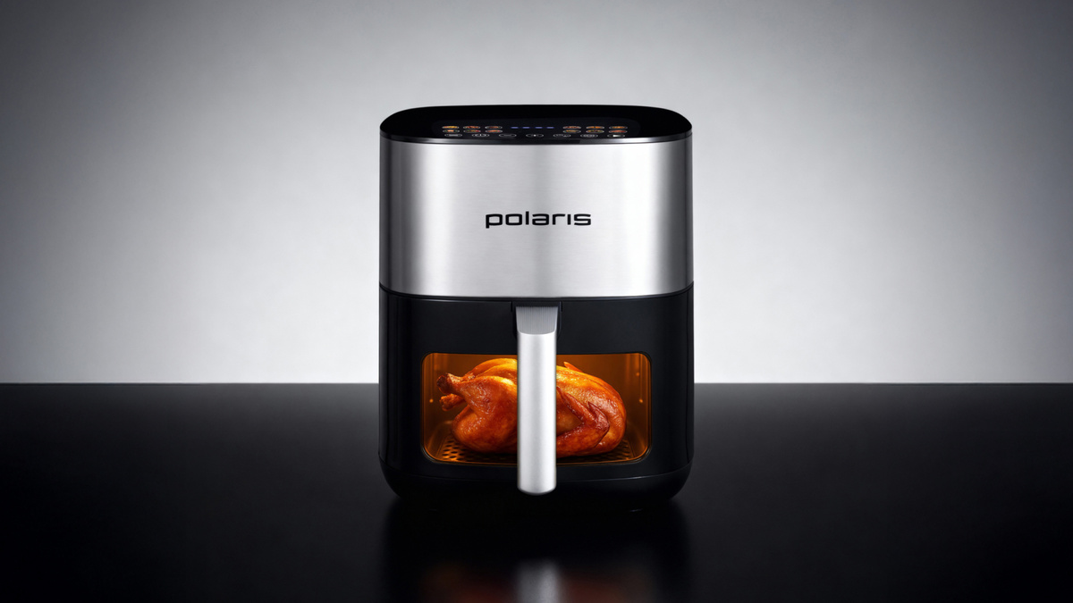Аэрогриль Polaris с мощностью 2000 Вт и смотровым окном — удобно следить за процессом.