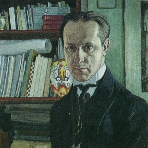 М.В. Добужинский ( 1875 - 1957). Автопортрет. У книжной полки.1910