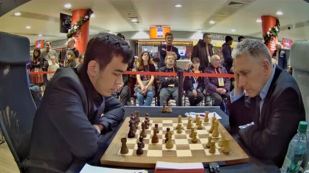 Фрагмент встречи АДАМС – АБДУСАТТОРОВ взят с прямой трансляции партии в Интернете.