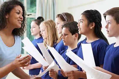 Singing in the school choir is a popular extra-curricular activity.