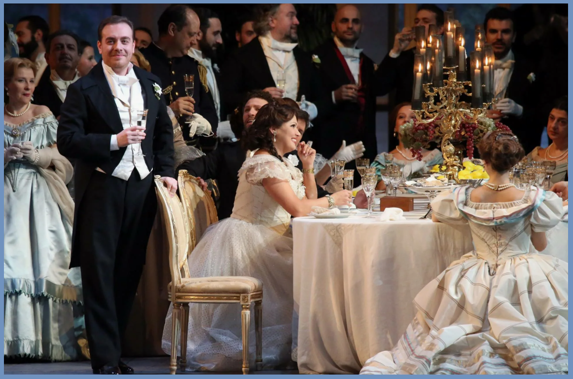 СЦЕНА ИЗ  ОПЕРЫ  ТРАВИАТТА.  АННА НЕТРЕБКО  ЗА  СТОЛОМ, 