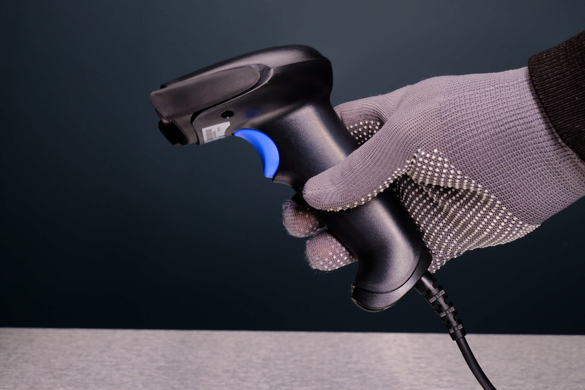 На фото ручной проводной сканер PayTor BB-2008 Lite. Источник: PORT Production