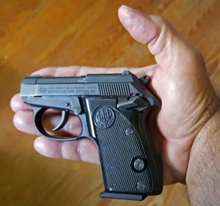 Пистолет в руке.