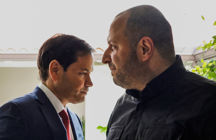    Рустем Умеров и Марко Рубио.REUTERS/Eva Marie Uzcategui