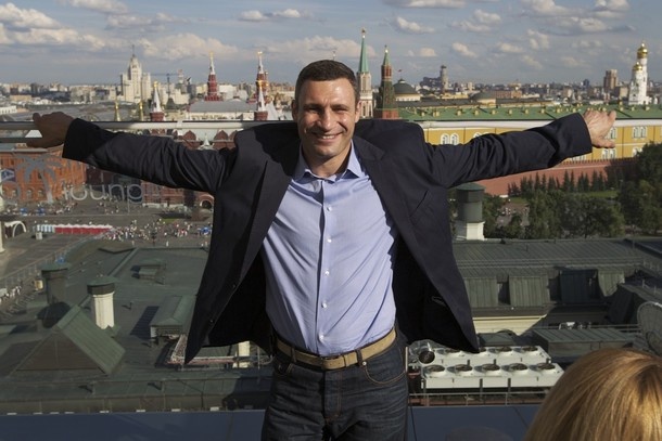    Heavyweight boxing champion Vitali Klitschko, of Ukraine, poses on a hotel roof in Moscow, Monday, July 16, 2012, with Moscow's Kremlin at the background. Klitschko will face Manuel Charr of Germany in Moscow on Sept. 8. (AP Photo/Ivan Sekretarev)