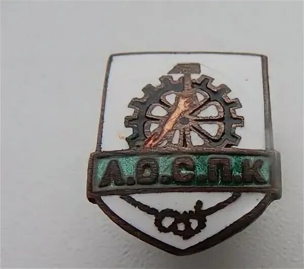 А эмблема всесоюзной Промкооперации была такова, я думаю многие болельщики ФК Спартак (Москва) её видели: