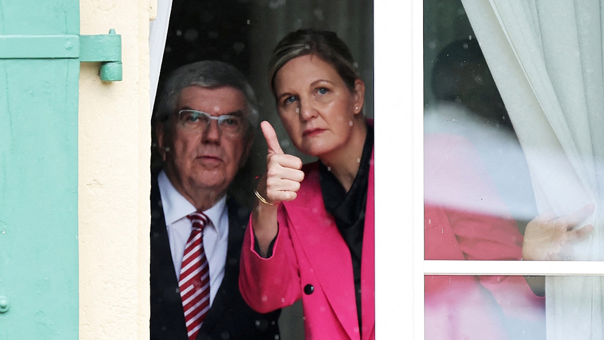    Томас Бах и Кирсти Ковентри. Фото: REUTERS