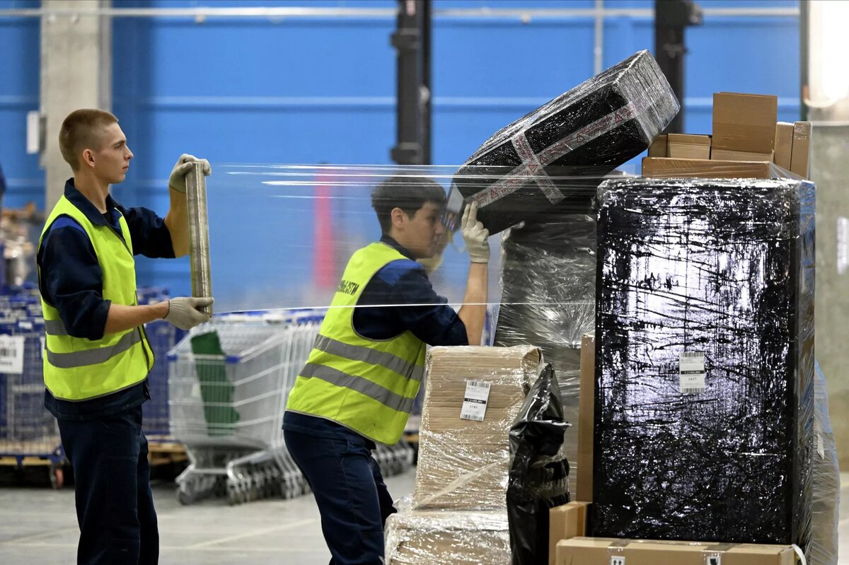 Распределительный центр маркетплейса, архивное фото
© Sputnik / Максим Богодвид