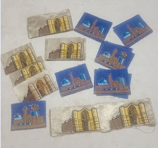 Полинины вышивки. На синем фоне стилизованная Хива, а на песочном Мавзолей Ходжи Ахмеда Ясави в г. Туркестан.