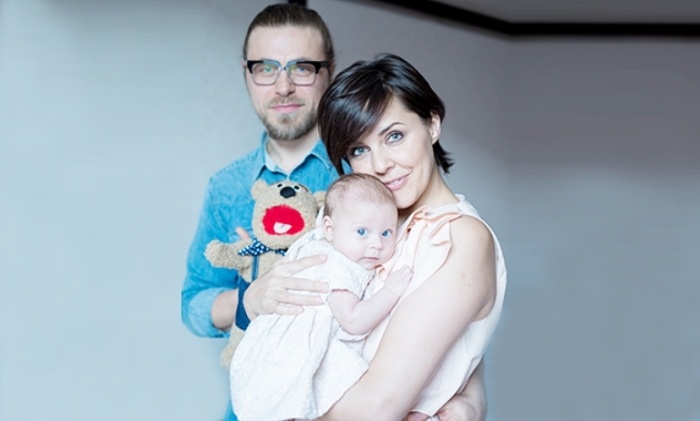 Ольга Шелест и и Алексей Тишкин с дочерью.