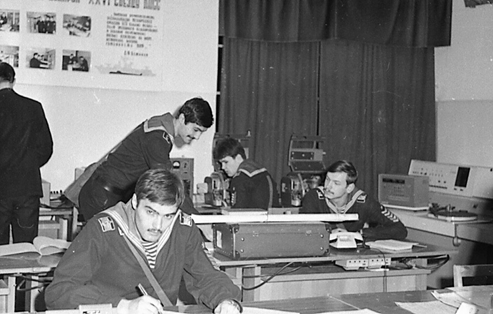 Плакат на стене с моими фотографиями. А у меня их сейчас и нет.